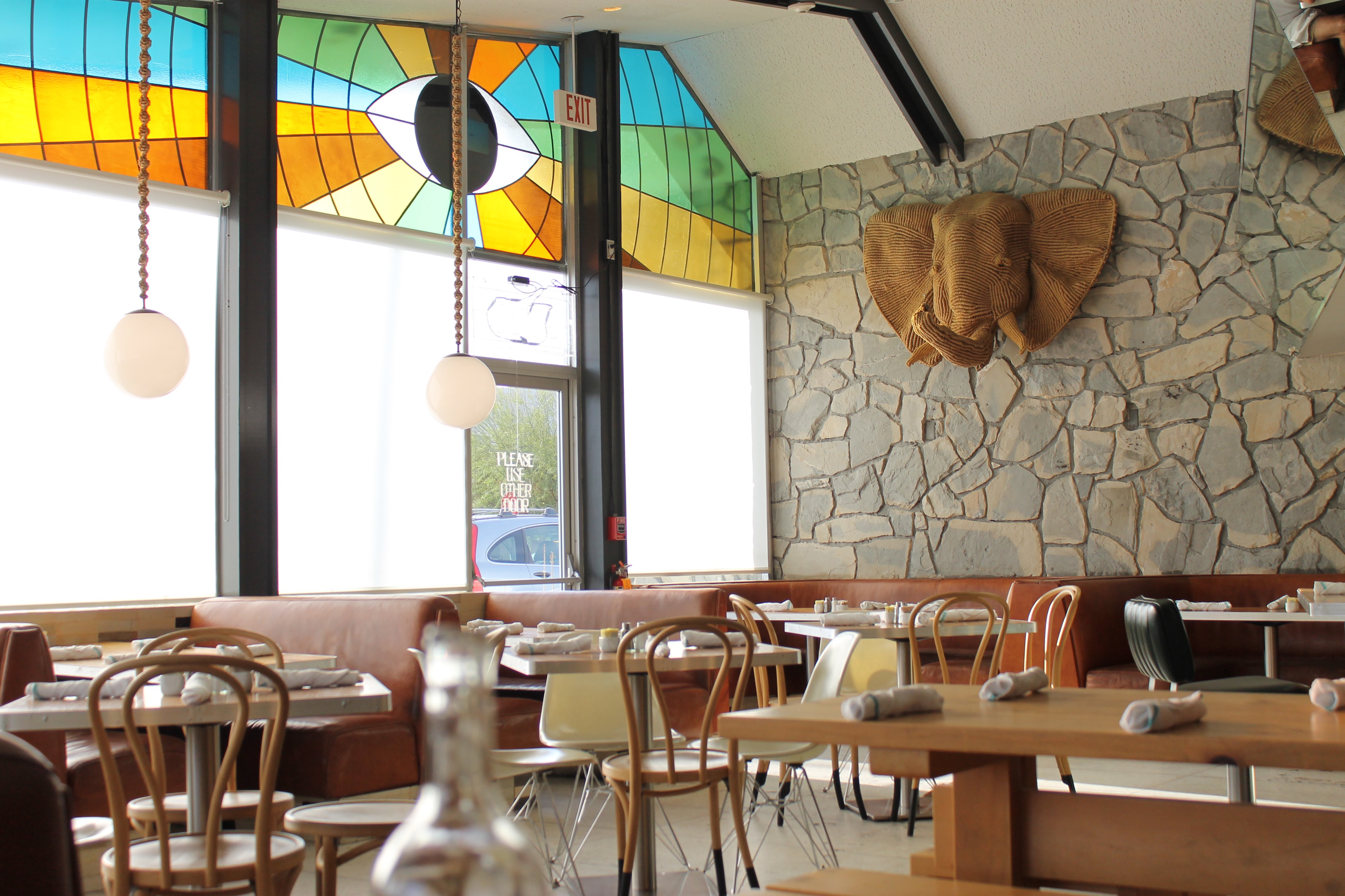 An empty dining room at the Ace Hotel, Palm Springs, King's Highway, set and empty